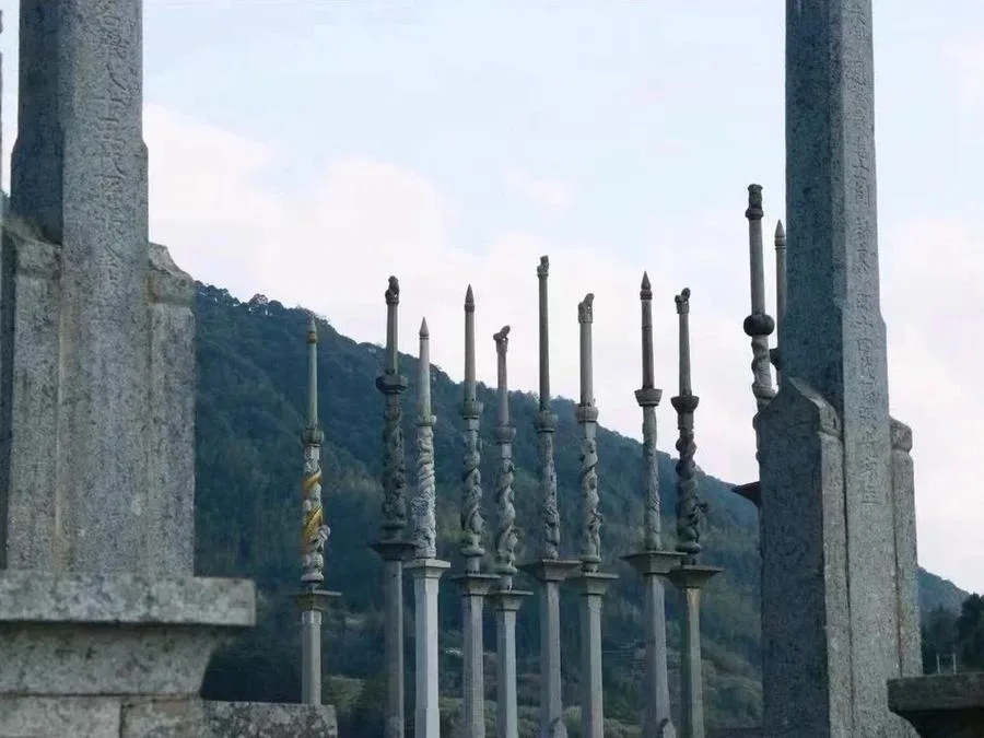 shilong-flagpoles-in-taxia-village-jpg shilong-flagpoles-in-taxia-village-jpg